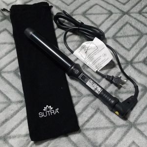 Sutra clipless curling iron with cool tip.